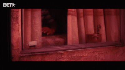 Boy Looking Out Window With BET Logo GIF