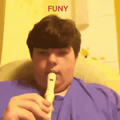 Boy Playing Flute Saying Funy