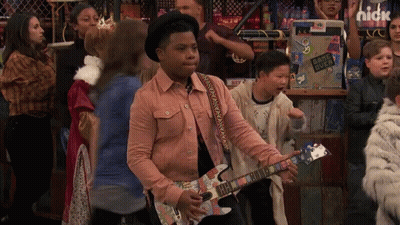 Boy Playing Guitar With Game Over Sticker GIF