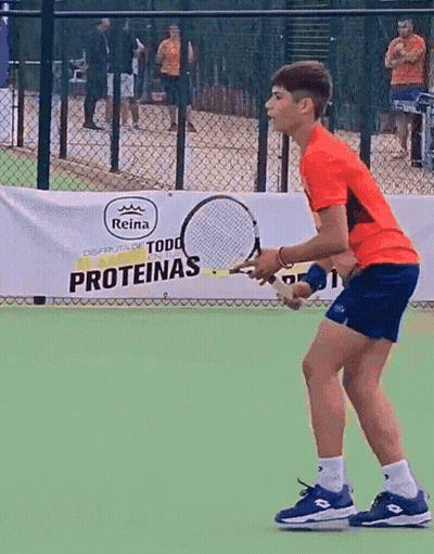 Boy Playing Tennis With Proteinas Banner GIF
