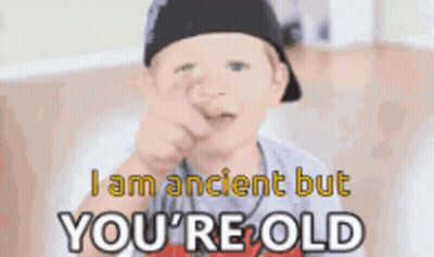 Boy Pointing At Camera Saying I Am Ancient But You're Old GIF