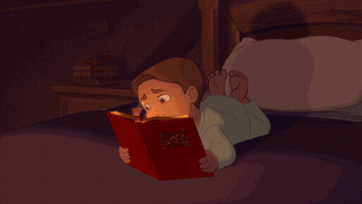 Boy Reading Bible On Bed GIF