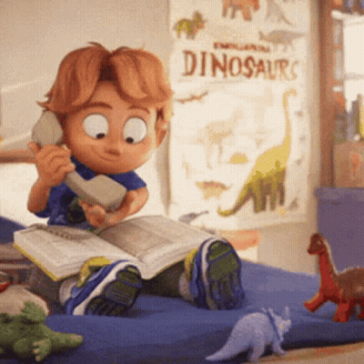 Boy Reading Book And Phoning Beside Dinosaurs Poster GIF