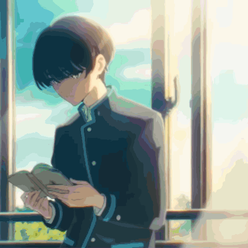 Boy Reading Book In Front Of Window GIF