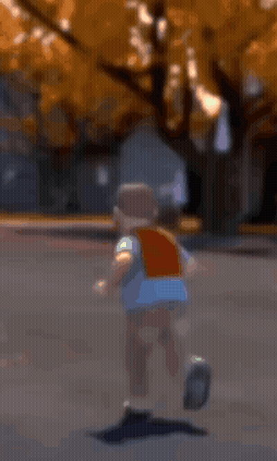 Boy Running Down Street GIF