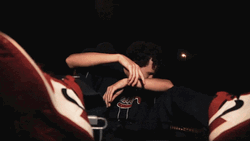 Boy Sitting Headbanging GIF