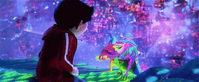 Boy Sitting On Rock Looking At Colorful Lizard GIF
