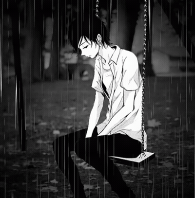 Boy Sitting On Swing In Rain GIF