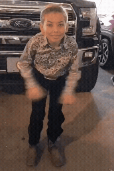 Boy Standing In Front Of Ford Truck GIF