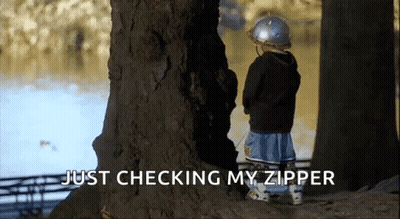 Boy Standing Next To Tree Saying Just Checking My Zipper GIF