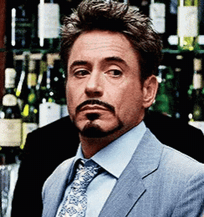 Boy Sticking Tongue Out In Front Of Parental Advisory Poster GIF