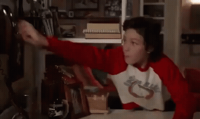 Boy Talking On Cell Phone GIF
