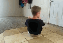 Boy Using Kitchen Bowl As Spinner GIF