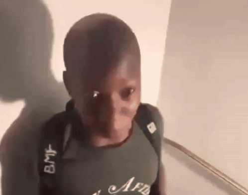 Boy Wearing Backpack And AFB T-Shirt GIF