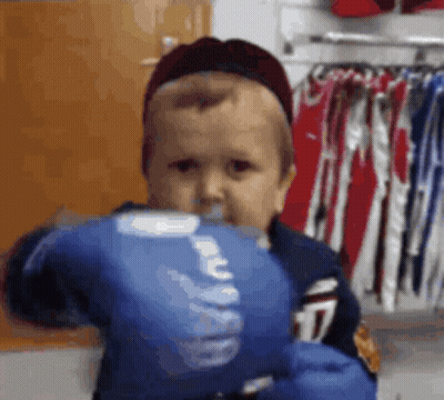 Boy Wearing Blue Boxing Glove 17 GIF