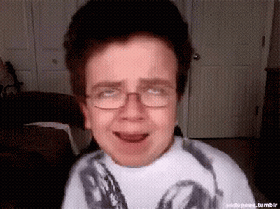 Boy Wearing Glasses Making Funny Face GIF