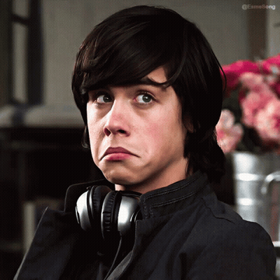 Boy Wearing Headphones Making Funny Face GIF