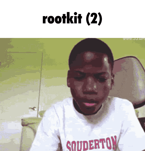 Boy Wearing Souderton Shirt Looking at Camera
