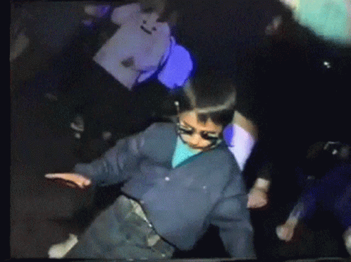 Boy Wearing Sunglasses Dancing In Crowd GIF
