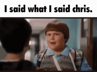 Boy With Backpack Talking To Another Boy GIF