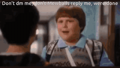 Boy With Backpack Talking To Another Boy In School Hallway GIF