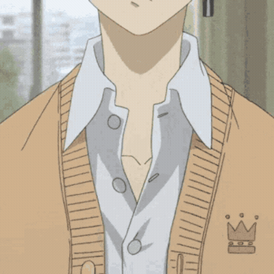 Boy With Cross Earring In Tan Sweater GIF
