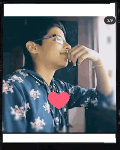 Boy With Glasses And Heart Sticker