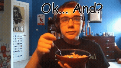 Boy With Glasses Eating Cereal Saying Ok GIF
