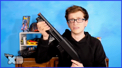 Boy With Glasses Holding Shotgun Disney XD Logo GIF