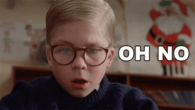 Boy With Glasses Says Oh No In Front Of Santa Claus GIF