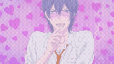 Boy With Glasses Surrounded By Pink Hearts GIF