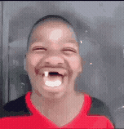 Boy With Missing Tooth Making Funny Face GIF