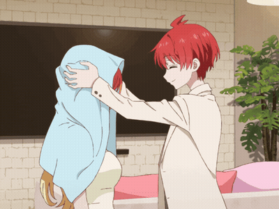 Boy With Red Hair Hugging Girl With Blue Towel GIF