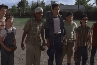 Boys Running Across Dirt Field GIF
