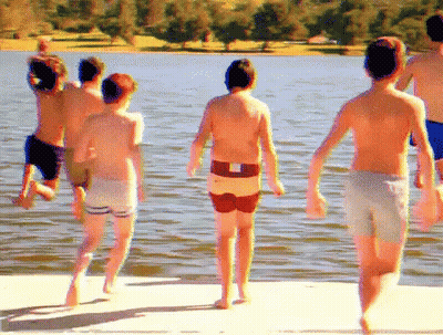 Boys Running Into Lake GIF