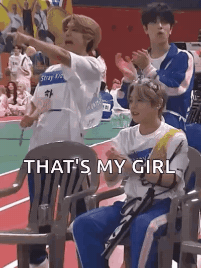 Boys Sitting On Basketball Court One Pointing GIF