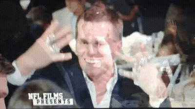 Brady Kneeling On Football Field GIF
