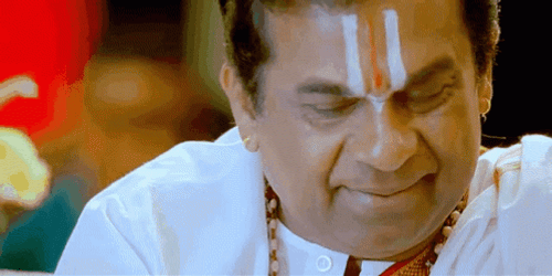 Brahmi Shy Smile GIF