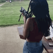 Braided Hair Girl Shooting Practice