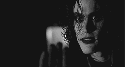 Brandon Lee Covers Gun Hole GIF