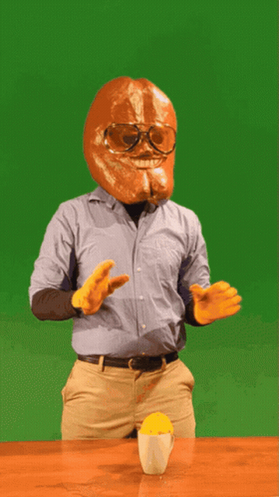 Bread Head Man With Glasses Next To Orange Juice GIF