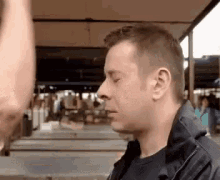 Breaking An Egg Into Someone's Head GIF