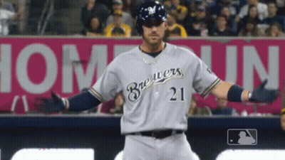 Brewers Baseball Player In Front Of Pink Sign GIF
