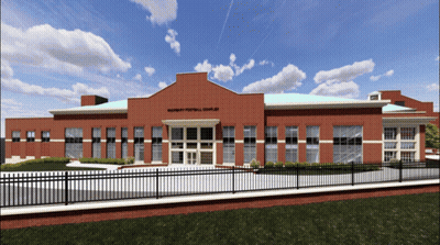 Brick Building Saying Northeast Football Complex GIF