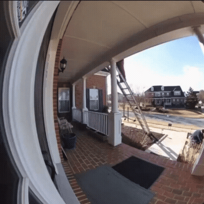 Brick House With Porch Saying Roofing GIF