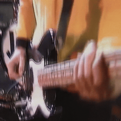 Brick Wall With Neon Bass Frenzy Sign GIF