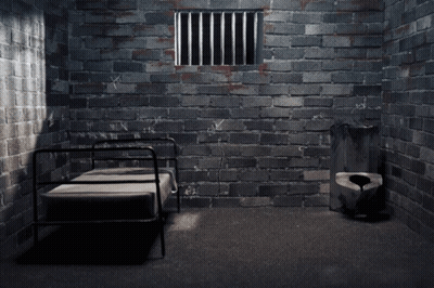 Brick Wall With Prison Cell Hole GIF