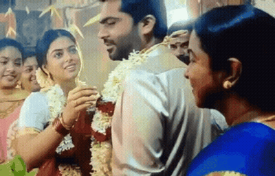 Bride And Groom At Wedding With Crowd GIF