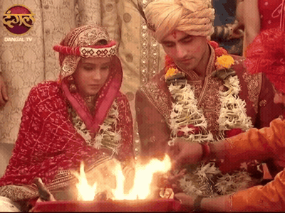 Bride And Groom Before Fire With Dangal TV Logo GIF
