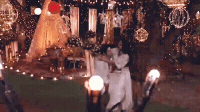 Bride And Groom Dancing At Decorated Table GIF
